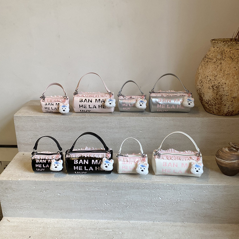 letras coreanas de estilo extranjero, bolsas de hombro para niños y niñas, colgantes de encaje, bolsas de barril para bebés, nuevas bolsas para niños