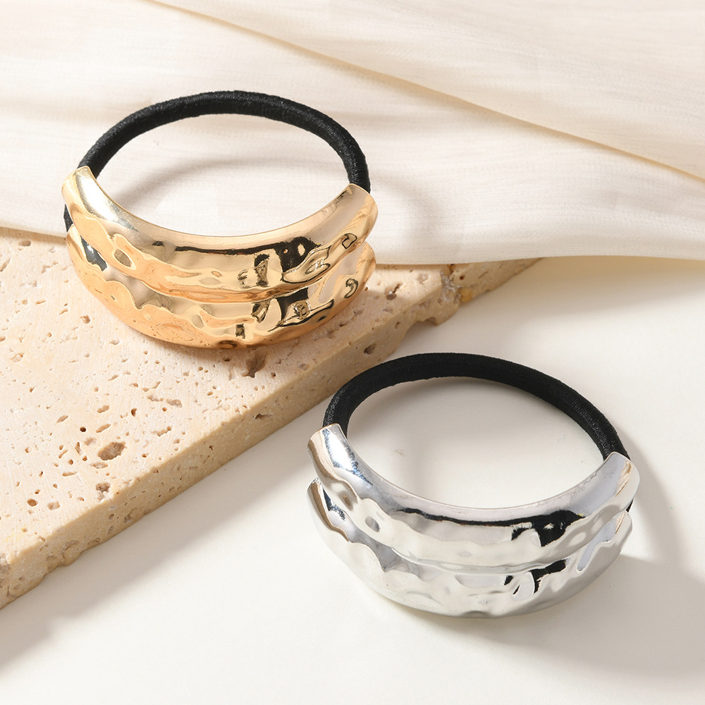 Viento frío europeo y americano, metal geométrico, anillo para el cabello elástico cóncavo y convexo, nuevo anillo para el cabello líquido de temperamento, cuerda para el cabello de alta elasticidad de todo fósforo
