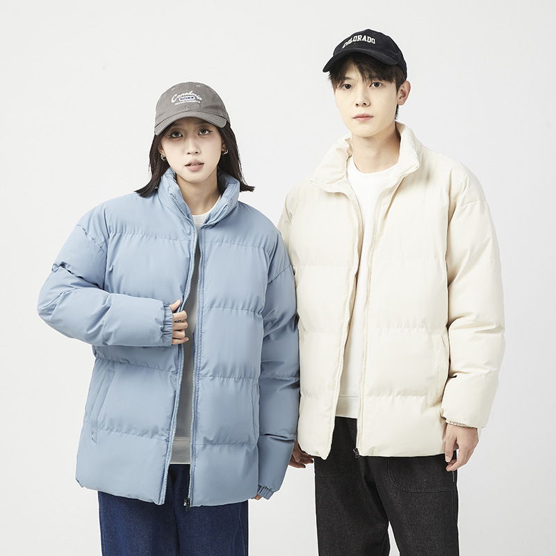 Algodón de color sólido para hombres 2024 nueva ropa de algodón de invierno pareja coreana chaqueta de pan de algodón chaqueta de invierno ligera al por mayor