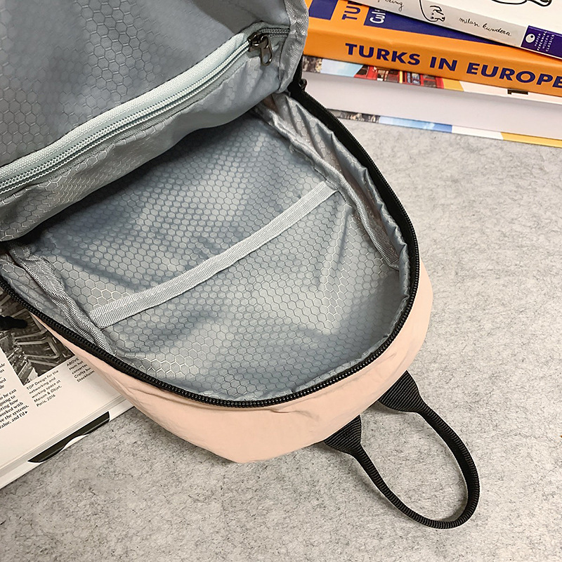 Nuevo estilo pequeño y fresco bolso de mensajero de pareja para hombres y mujeres, mochila de moda simple, mochila de ocio al aire libre de ciclismo multifuncional