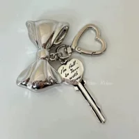 Корейский новый нишевый дизайн, пряжка в форме сердца, бант, английский ключ, сумка для мобильного телефона, подвеска, брелок