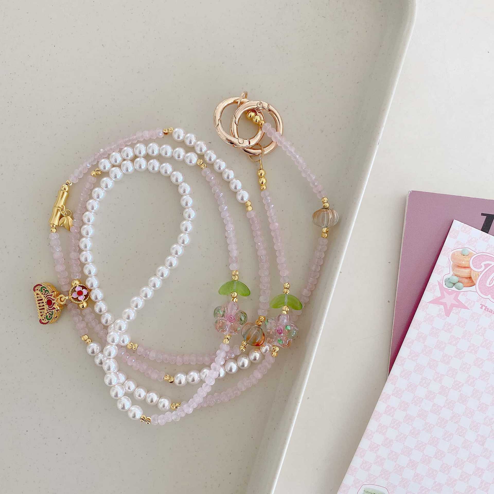 Cadena de teléfono móvil de alta gama hecha a mano de boutique, cadena de pulsera de flores, cordón de teléfono móvil de moda, cordón de mensajero largo y corto