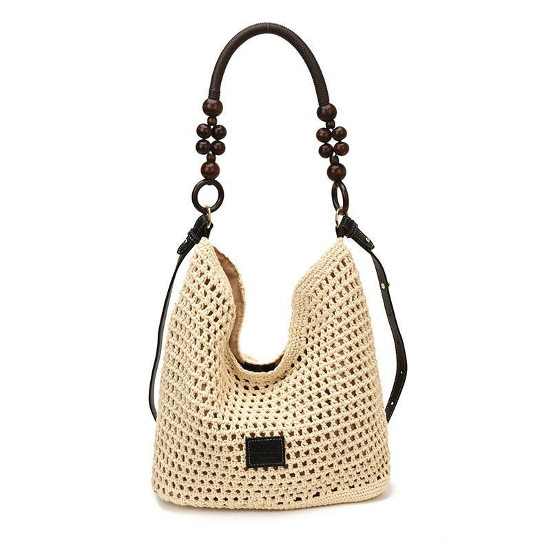 Bolsas de gran capacidad de tejido hueco para mujeres 2026 nuevas bolsas de playa de vacaciones en la playa de viaje nicho brazo Tote image 7
