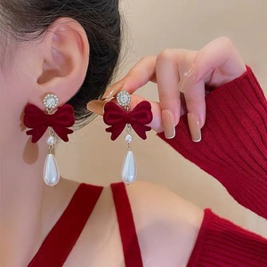 Red light flocking bowknot earrings tide of luxury niche design feeling senior stud earrings earrings female