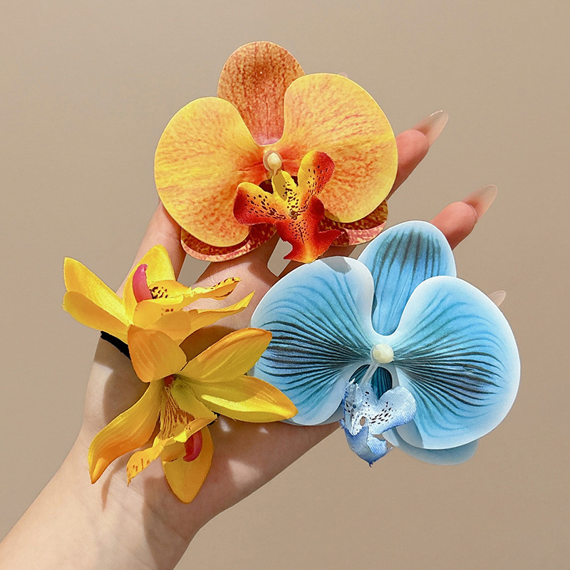 Atmosfera orquídea mariposa flores clip para el cabello mujeres primavera / verano 2025 nuevo clip lateral tocado tarjeta de cabello vacaciones de mar
