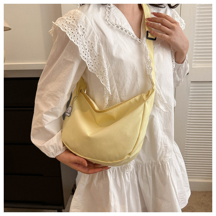Large capacity canvas shoulder for women in spring summer 2023, new solid color, simple and fashionable casual bag,_voghion.com