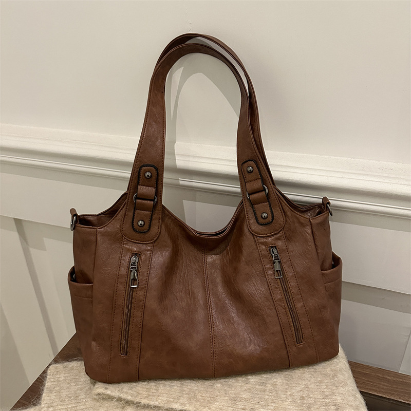 Bolso retro de gran capacidad 2025, nueva textura de moda para viajar bolso de mujer, viaje corto, mochila