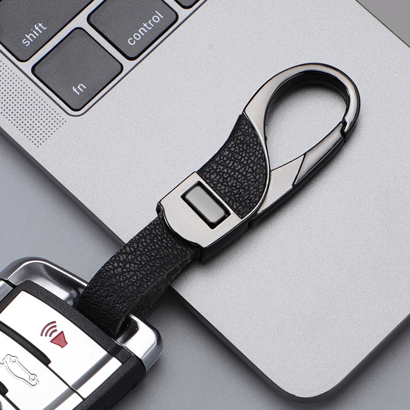 2024 llavero de coche transfronterizo explosivo, botón a presión de cuero de alta gama, colgante de llavero de negocios simple y personalizado