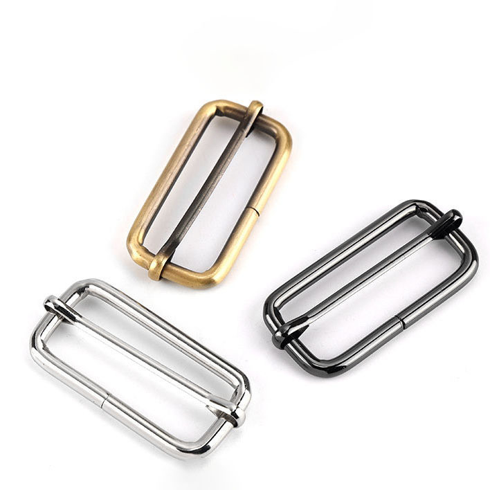 Suministro de varios tipos de especificaciones de hebilla de metal hebilla de hierro hebilla de hierro hebilla de tres engranajes hebilla de metal japonesa bolsa de ropa infantil