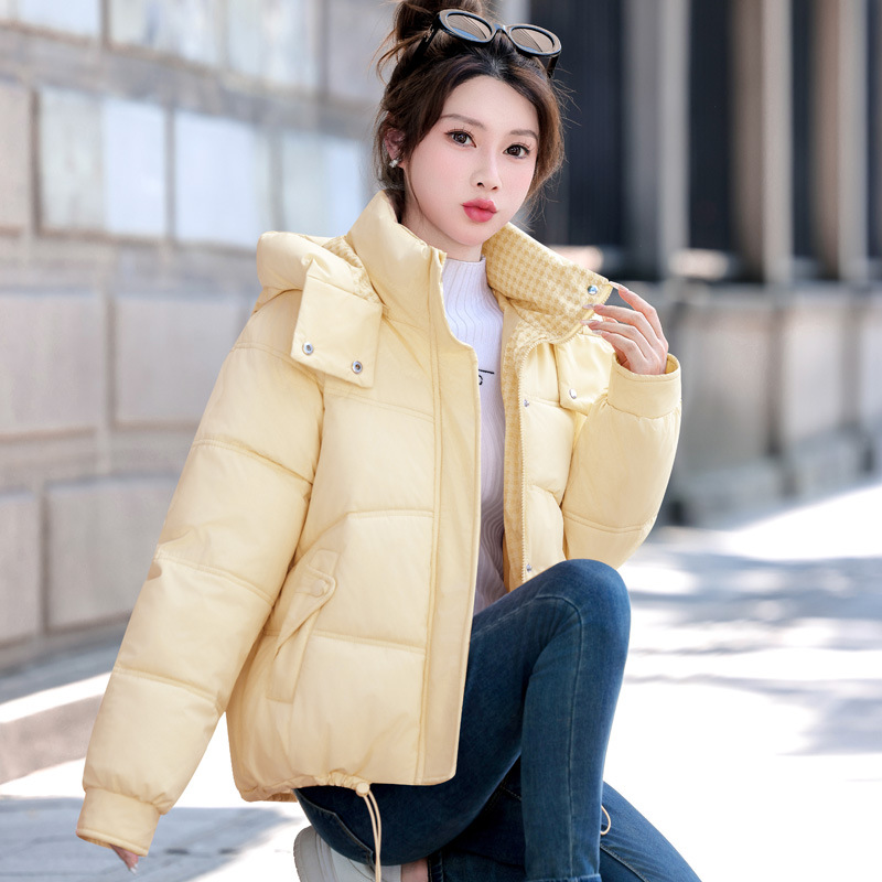 Sombrero desmontable ropa de algodón corta de invierno de mujeres 2025 nuevo algodón ropa de algodón gruesa calentamiento chaqueta de algodón de moda coreana de mujer