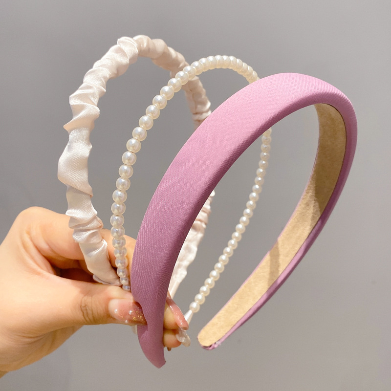 A principios de la primavera, la banda de cabello para mujeres en línea, 2025 nuevo lavado de cara de presión de tarjeta de cabello para el cabello, banda de cabello de perlas, banda de cabello para mujeres.