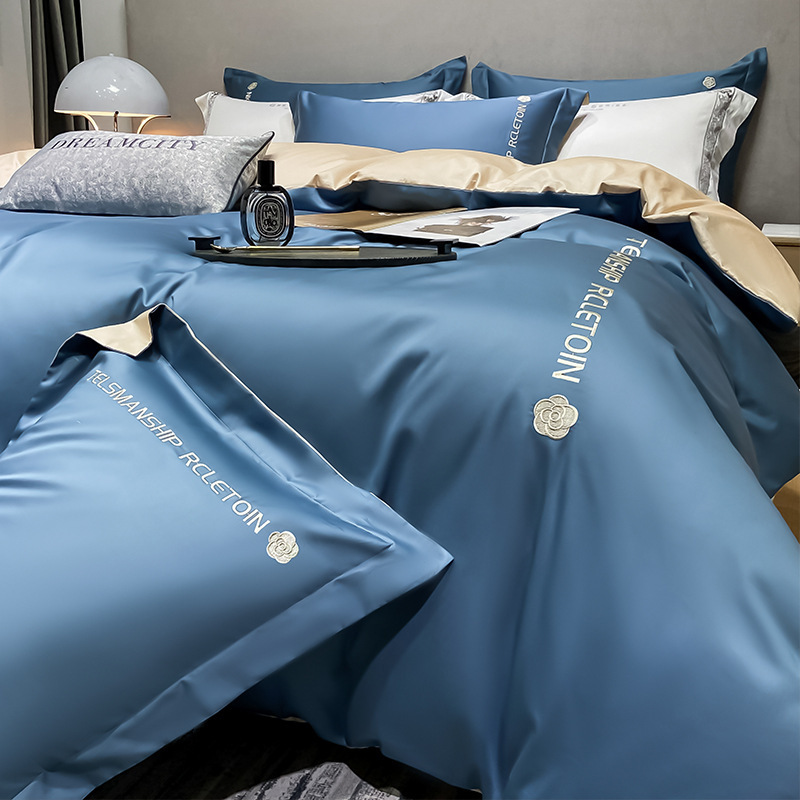 Fabricantes al por mayor 2025 nuevo conjunto de ropa de cama de cuatro piezas de hielo de verano sábanas de cama de seda cubierta de seda para dormir desnuda