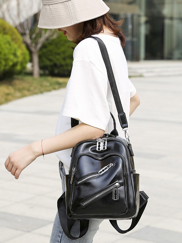 Bolsa multifuncional para mujeres 2025 nuevo tipo de pu suave verdadero retro al aire libre bolsa de viaje de viaje de viaje de viaje casual versátil mochila de mujer