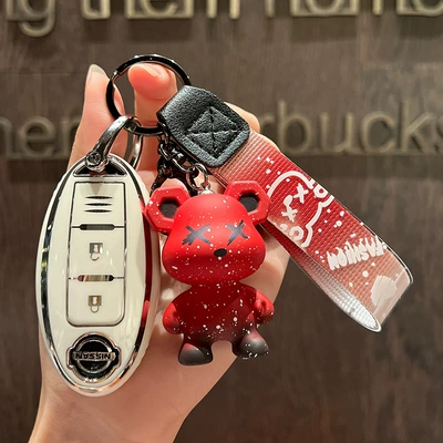 Key Case Qijun Qashqai: Car key bag - nissan-d-smart-3-key-single-shell-white-red-violence-bear-pendant