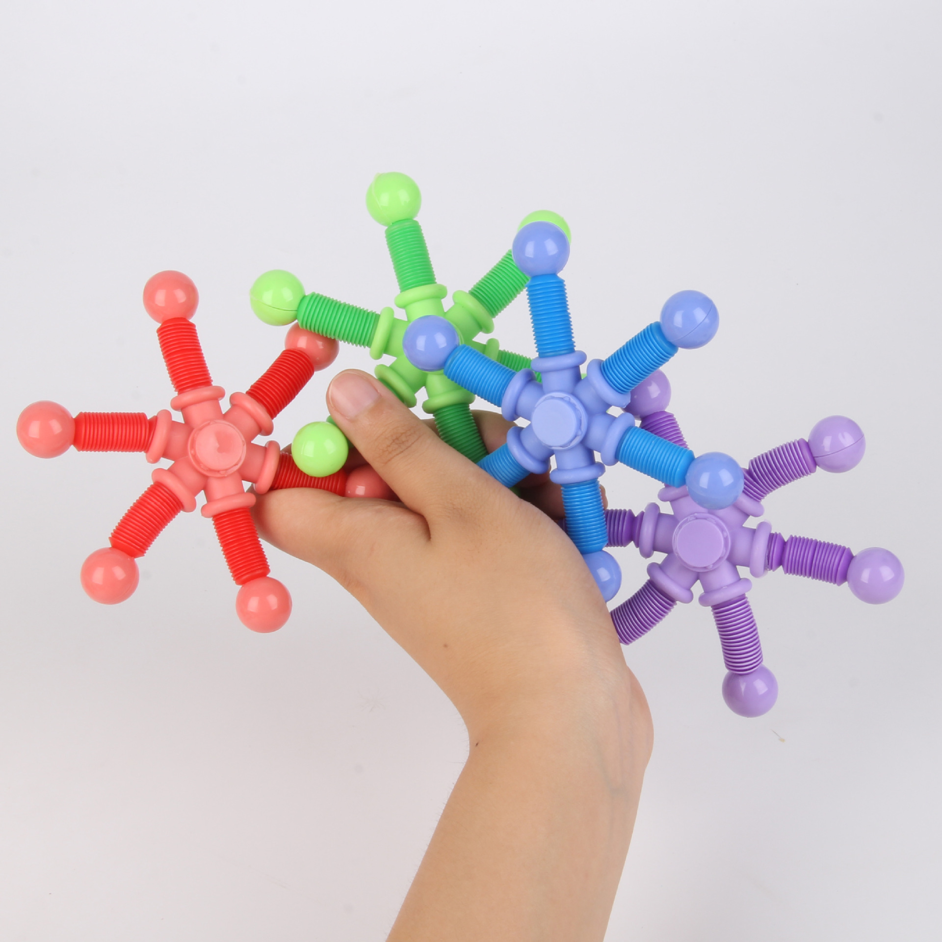 Vent red tubo dedo giroscopio juguete al por mayor Nueva deformación descompresión luminosa giroscopio cadena rotación descompresión