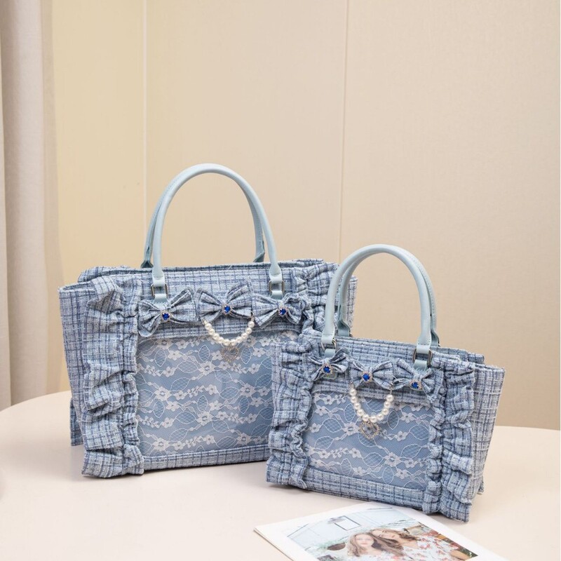 New style Chanel-inspired Japanese women's bag, ideal for cosplay and travel, made of tweed with lace, pleats, and a bow, a hand-held tote bag