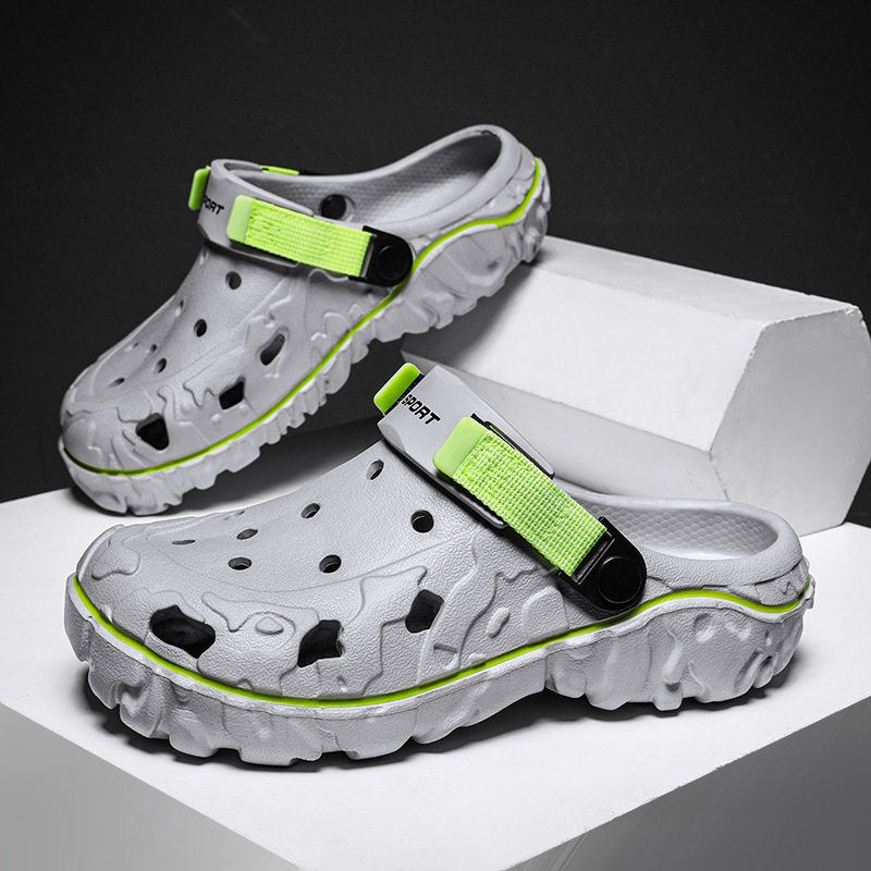 Verano nuevo estilo coreano de moda zapatos sandalias de jardín zapatos transfronterizos de tamaño grande versátil casuales dos zapatillas de moda para hombres