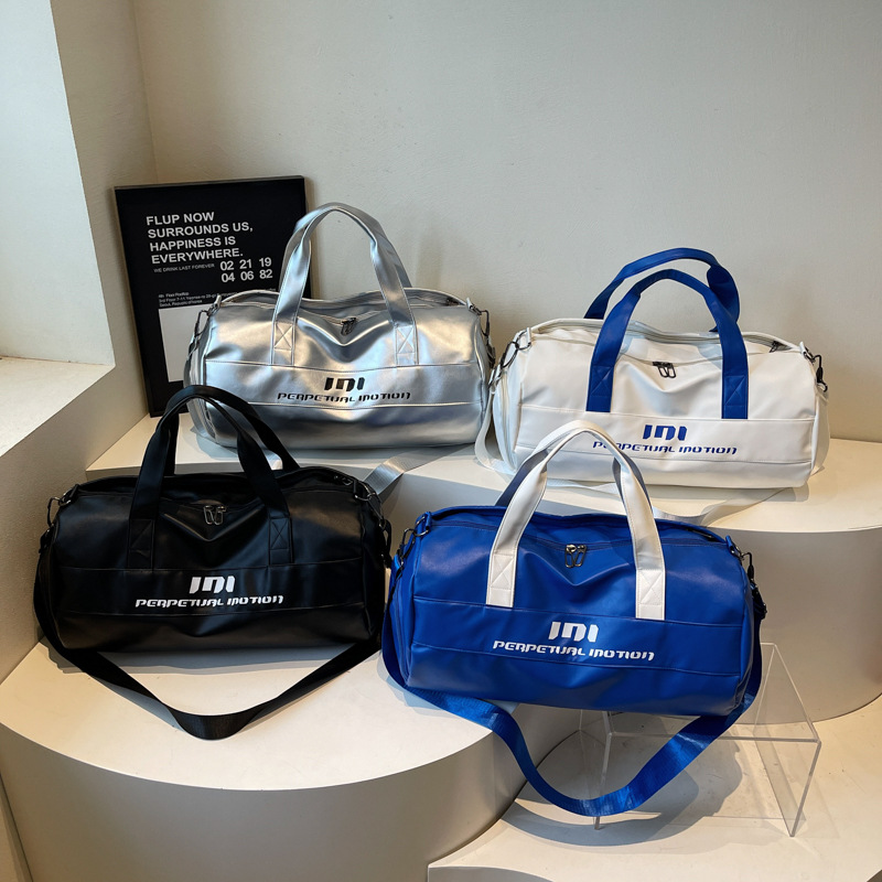 Bolsa de ejercicios mayorista de gran capacidad de separación seca y húmeda bolso deportivo de tendencia de cuero suave sensación mochila bolsa de viaje de embarque