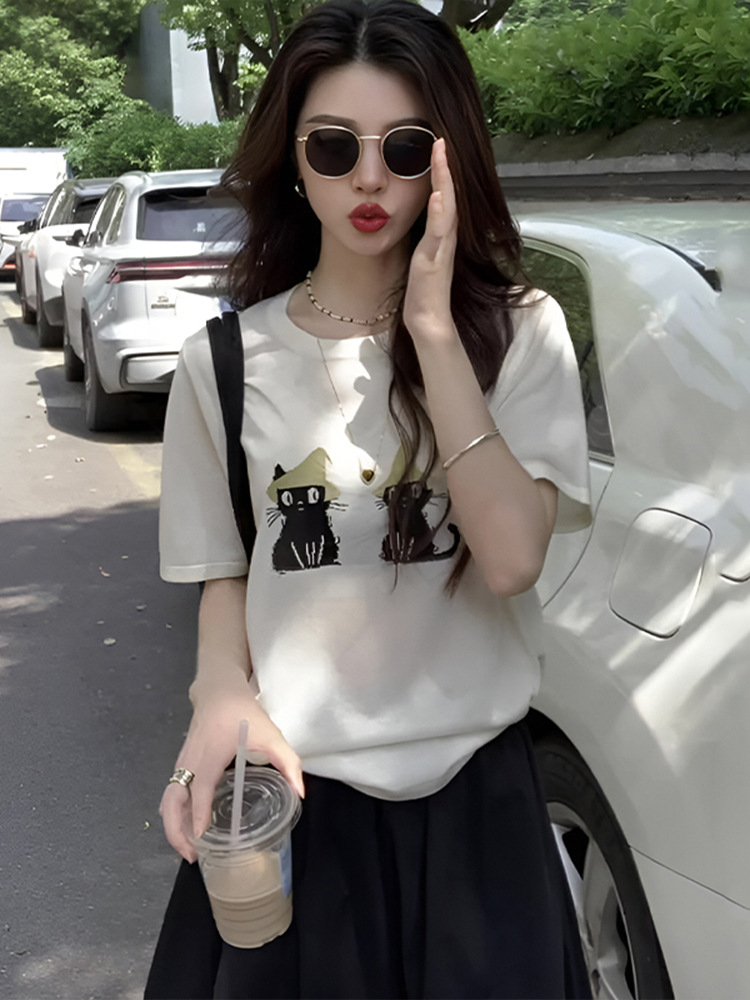 Áo thun nữ cổ tròn dáng rộng in họa tiết tay ngắn chất lụa đá mát lạnh — trắng