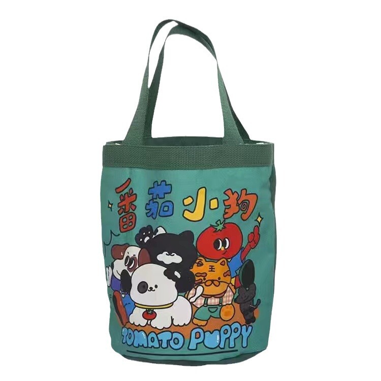 かわいい落書きバケツバッグinsプリント円筒バッグキャンバス弁当袋韓風少女は弁当箱を持っています。|undefined