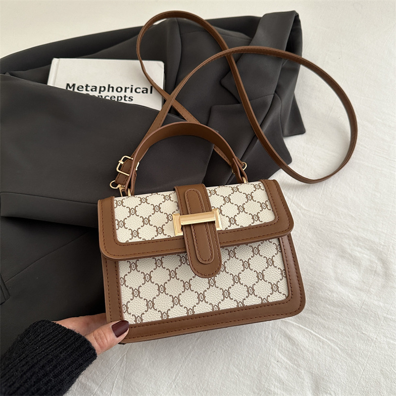 2025 nueva moda simple de alto valor de cara bolso de hombro de moda retrógrada impresión de personalidad bolso de viaje portátil pequeño