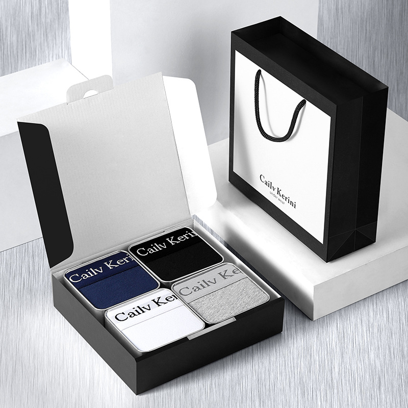 4 square boxes [sapphire blue + black + white + light gray]