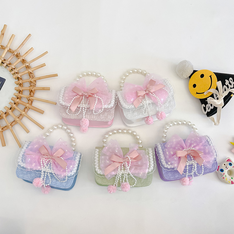 Nuevo arco niñas bolsa mensajero bolsa niños princesa Chanel estilo hombro bolsa bebé fuera moneda monedero bolsa