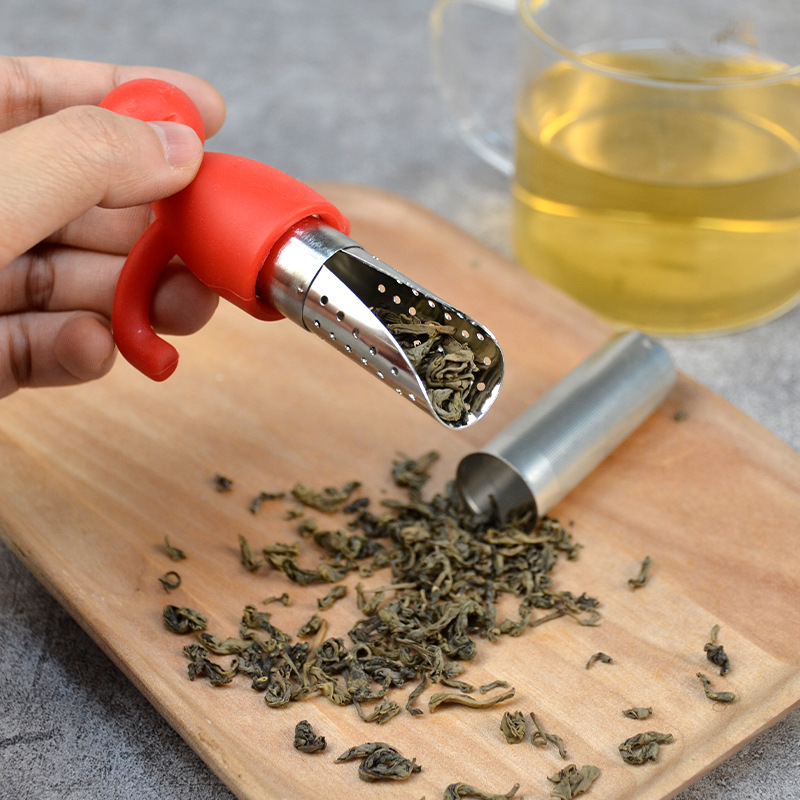 Colador de té creativo de acero inoxidable con cuchara de té colgando portátil de silicona en forma humana fabricante de té al por mayor lindo Filtro de té