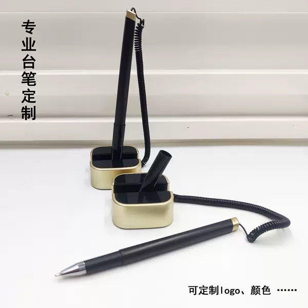 Luxury black pen with gold trim and a square base, suitable for business reception areas; features a spring-loaded cord to prevent loss and can be customized with a logo