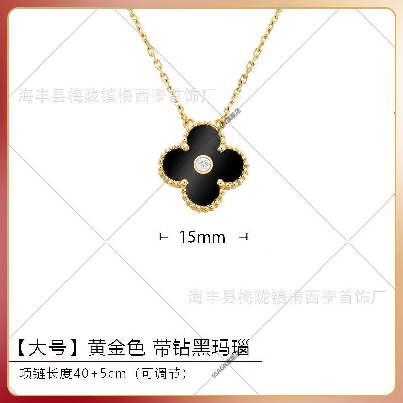 Large four-leaf clover necklace, gold, black onyx with diamonds in the middle