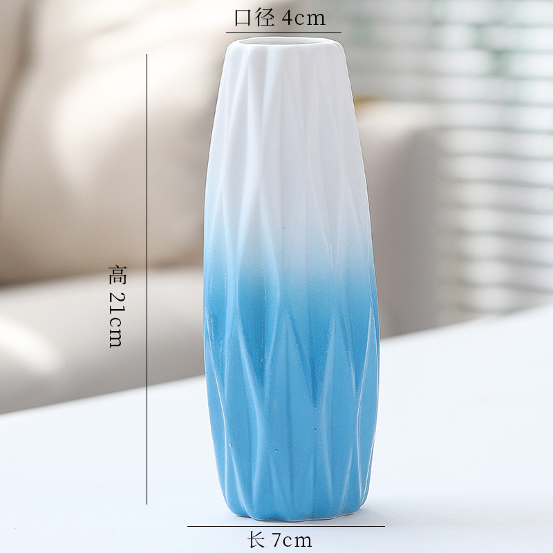 シンプルな現代の満天星陶磁器の花瓶の置物の客間の白い磁器の小さい清新な乾いた花の生け花の創意の陶磁器の花器|undefined