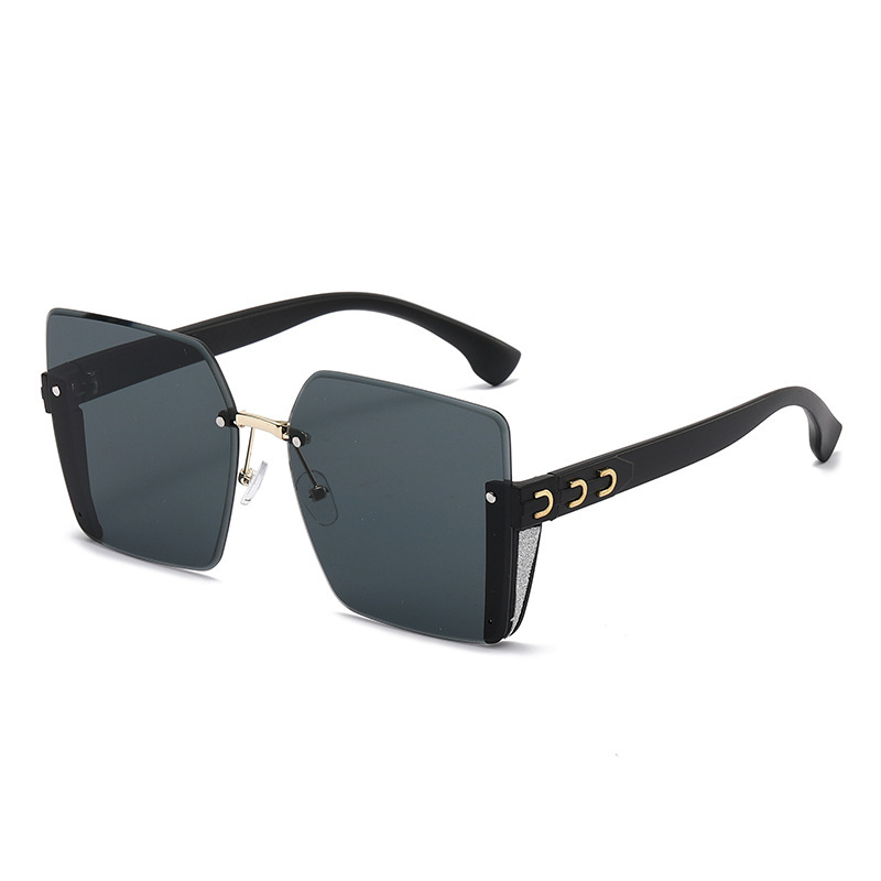 Nuevas gafas de sol de moda de alta calidad sin marco de borde de corte de las mujeres gafas de sol de gran marco a prueba de rayos UV gafas de sol de moda