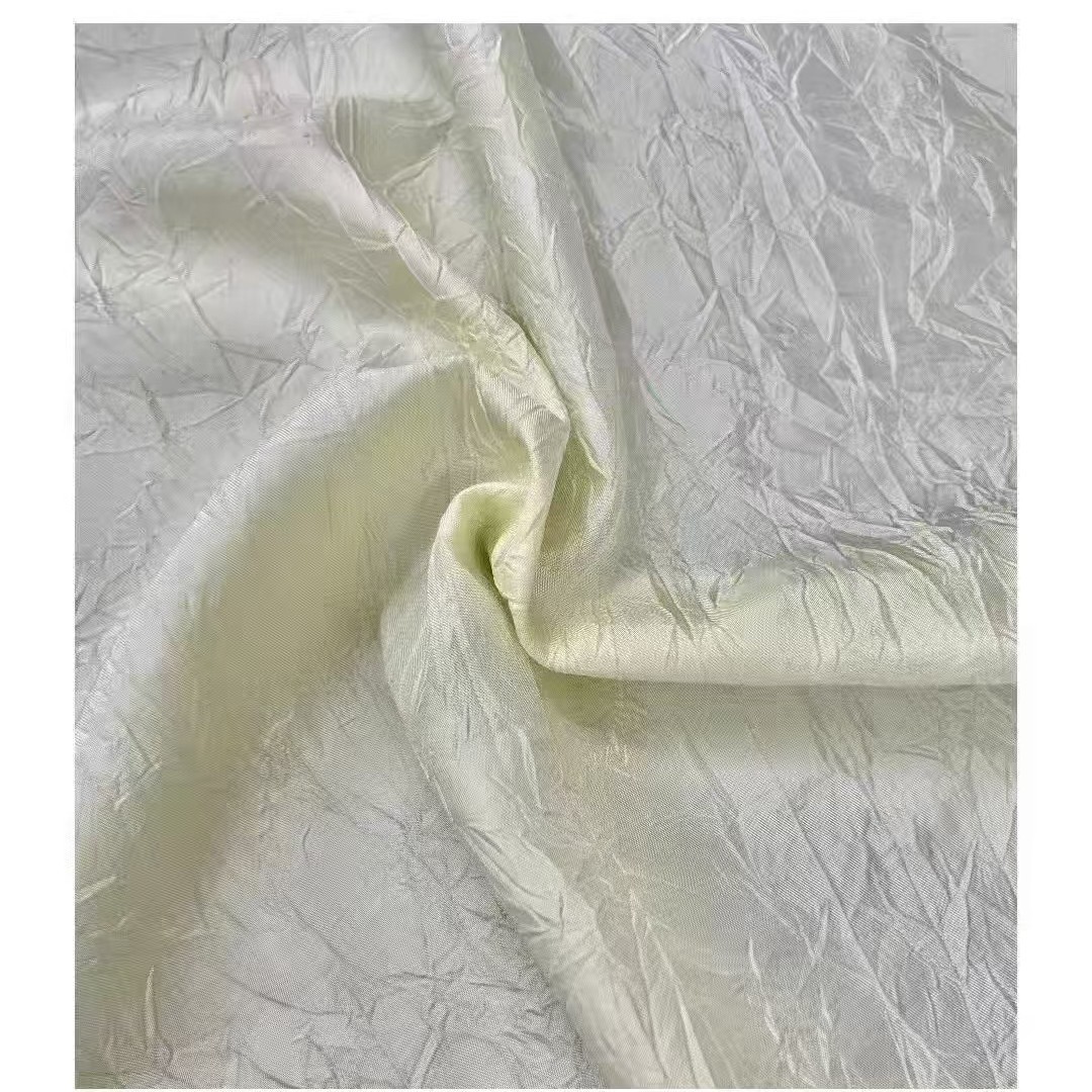 现货供应压折提花裙子吊带衬衫鞋帽箱包面料
