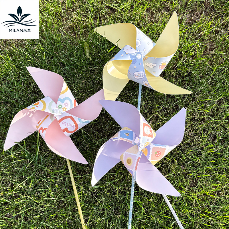 Día de los niños del 1 de junio dibujos animados molino de viento colorido juguetes hechos a mano paquetes de materiales DIY bocadillos ramo de flores decoración caja de regalo