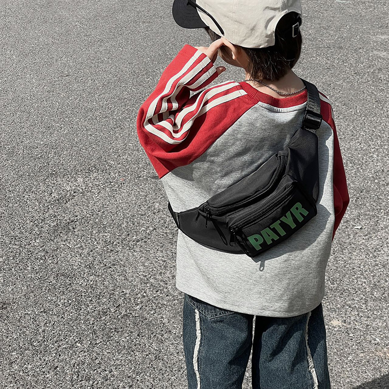 Bolsas coreanas para niños y niñas, letras extranjeras, bolsas de pecho para niños de color sólido, 2025 nuevas bolsas para niños de comercio exterior