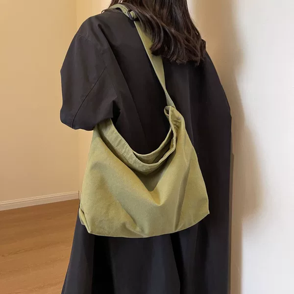 Korean and Japanese large-capacity canvas bag for women, 2026 new fashion, artistic solid color tote bag, minimalist forest-style school bag