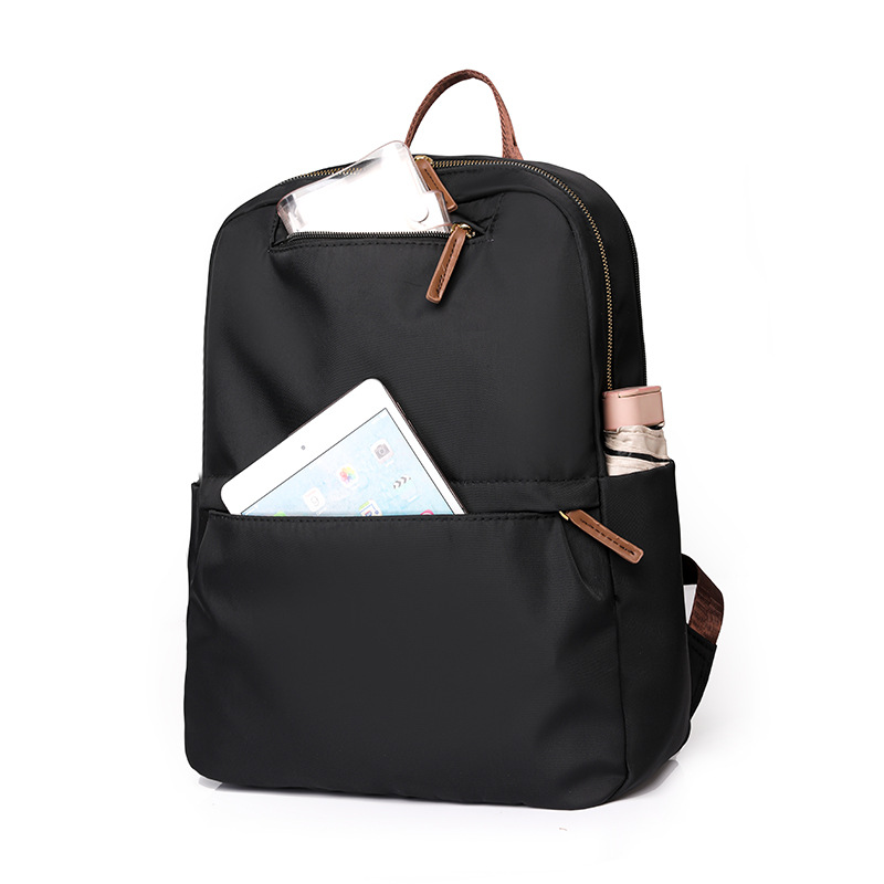 En stock al por mayor 2024 nuevas mujeres mochila de nylon simple color sólido gran capacidad ordenador mochila estudiante