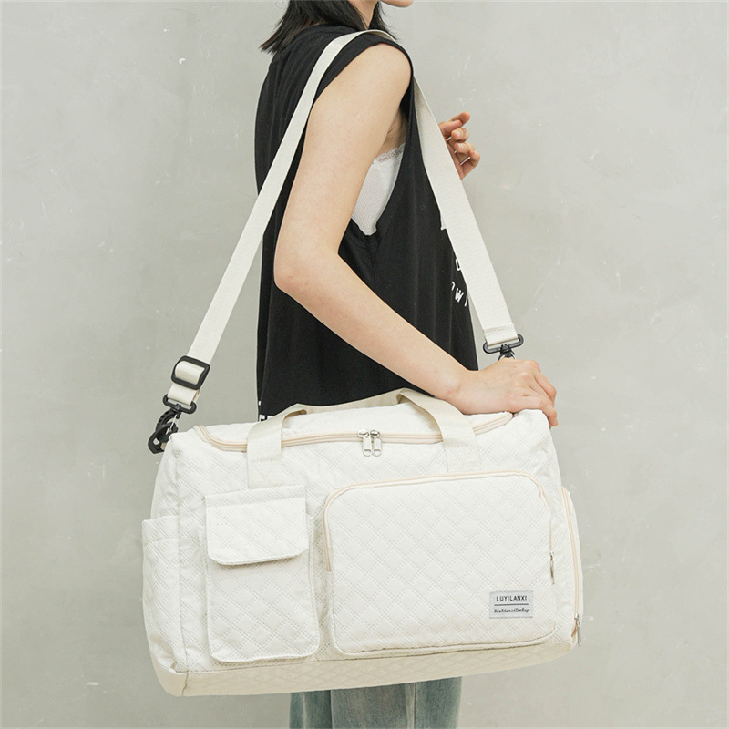 Bolsa de viaje de gran capacidad de moda de color sólido nuevo tipo de bolso deportivo al aire libre ligero bolso de mano multifuncional mujer