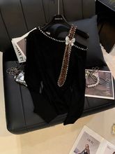 白枕鹤黑色上衣镶钻立体装饰轻奢长袖上衣女秋冬季斜肩法式修