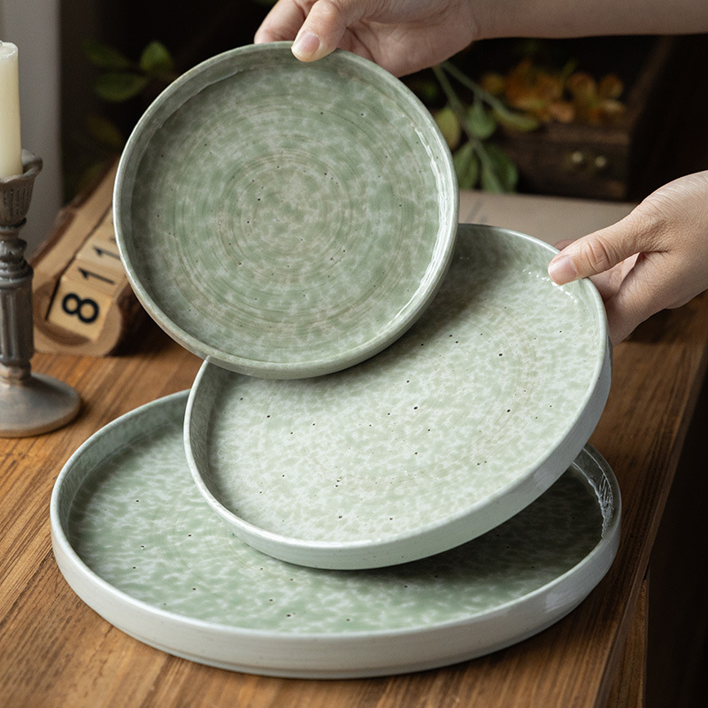 Plato redondo simple y práctico de cerámica doméstica de alto valor, platos de platos de pasta, platos de postres, platos de ensalada