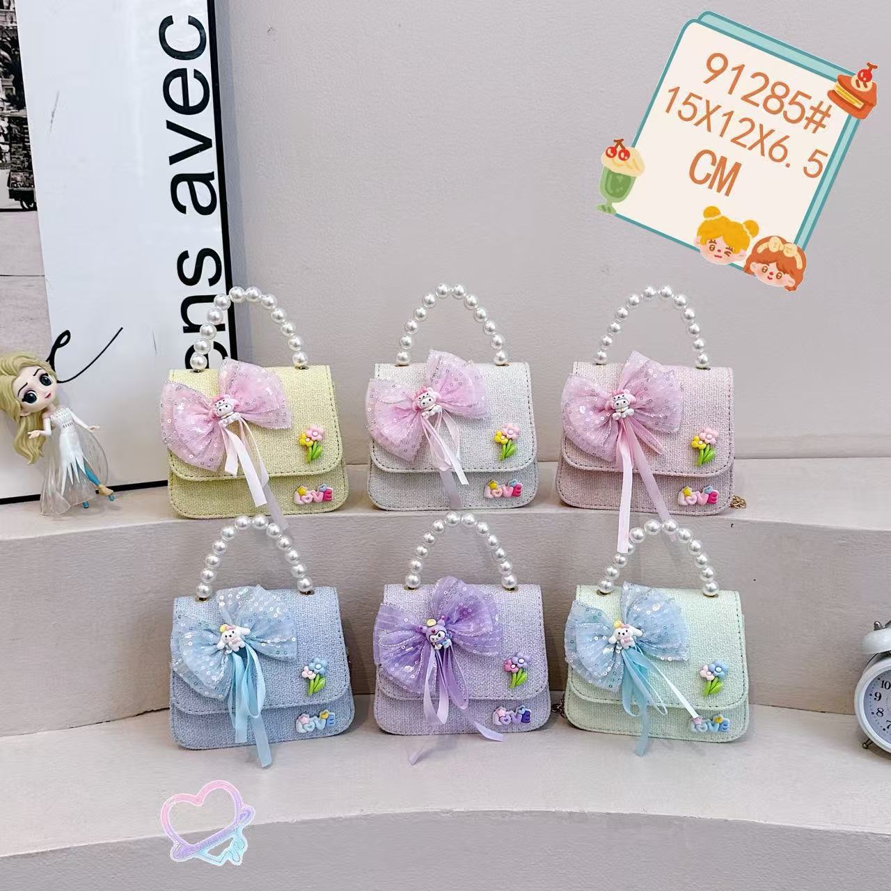 Nuevo comercio exterior pequeña fragancia niñas hombro mochila de moda perla arco bolsos de niños bolsos de cambio de dibujos animados