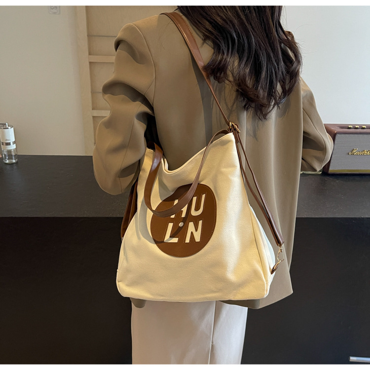 Korean letter printed multi-purpose cloth bag, 2024 new style, high-quality student backpack, commuting single-shoulder bag undefined