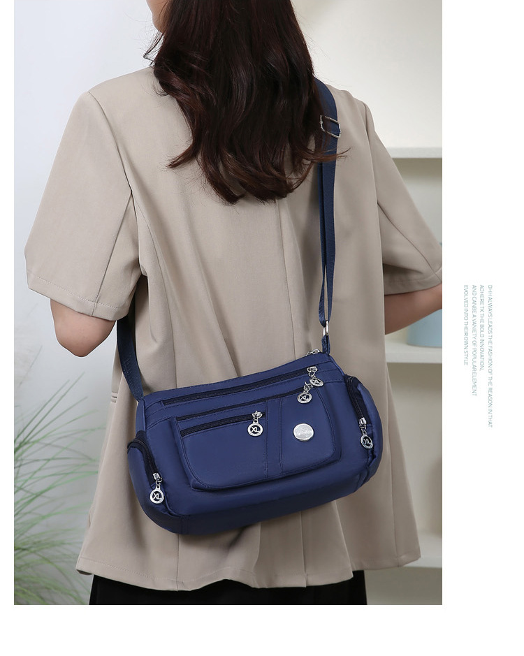 A new popular women's crossbody bag with multiple layers made of Oxford fabric, fashionable, casual and trendy. It's a single-shoulder bag for middle-aged and elderly mothers undefined