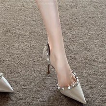 尖头性感侧空铆钉鞋高跟凉鞋女2025秋冬新款裸色浅口柳丁时尚单鞋