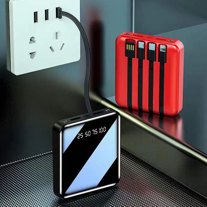 Cuatro líneas de pantalla digital de carga rápida de gran capacidad de diseño poroso compacto portátil de 20000 mAh rojo negro