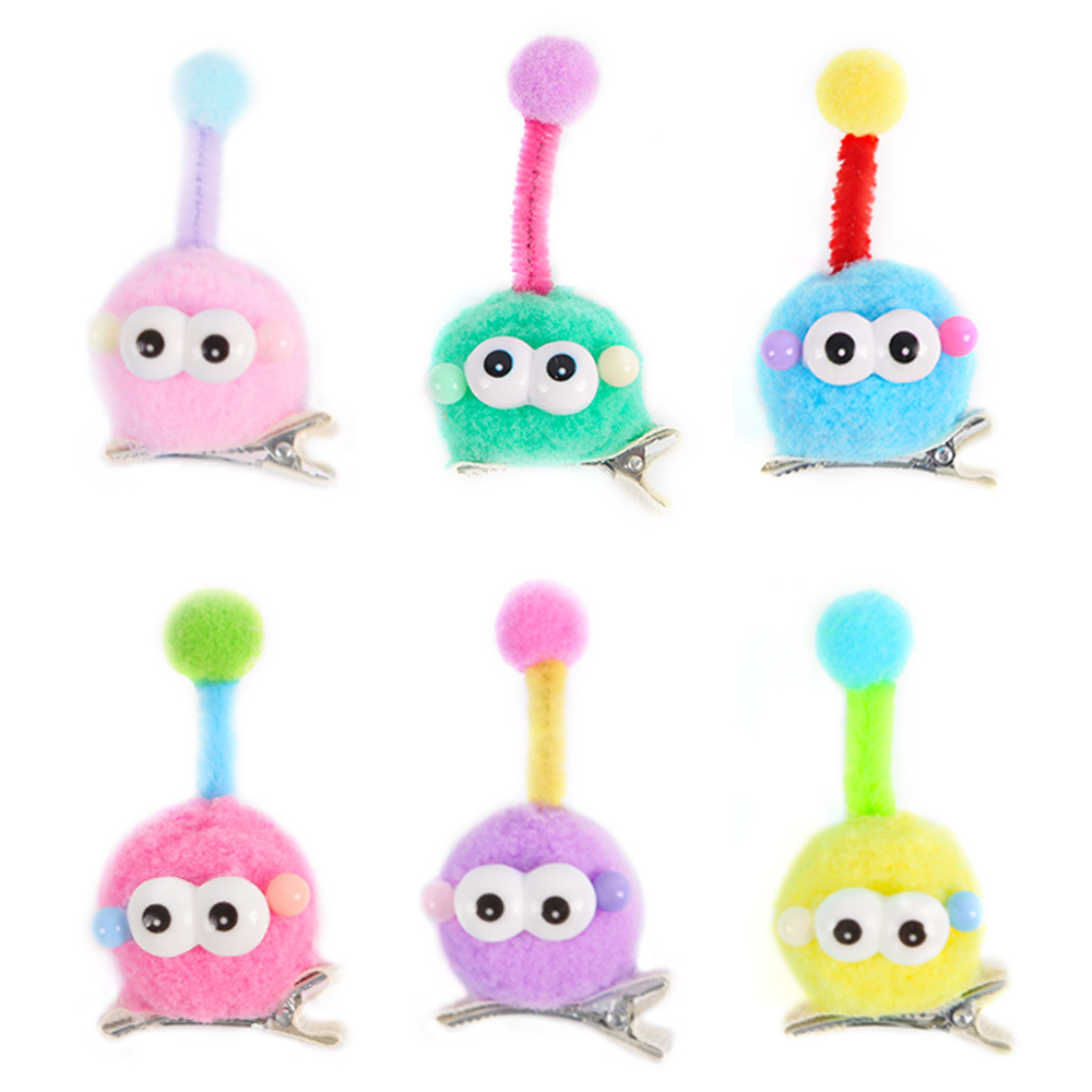 Nuevos niños lindos brocas de pelo de bola de carbón dopamina colorida antena muñeca brocas de pelo extrañas bolas de pelo de ojos grandes