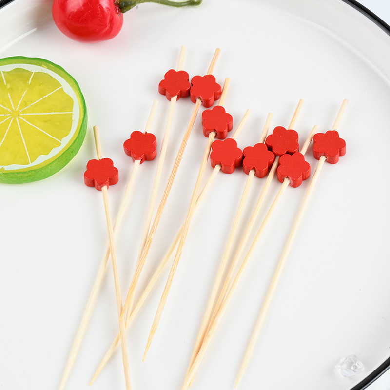 Fábrica de suministro desechable flores rojas horquilla de fruta palillos de dientes de dibujos animados palillos de frutas palillos de dientes artísticos palillos de bambú