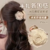 Beige crab pin, flowered