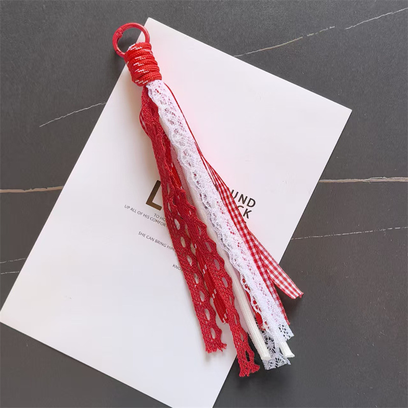 Accesorios de éxito en línea de teléfono móvil cordón de encaje de viento de dopamina accesorios bolsos llaveros colgantes al por mayor image 9