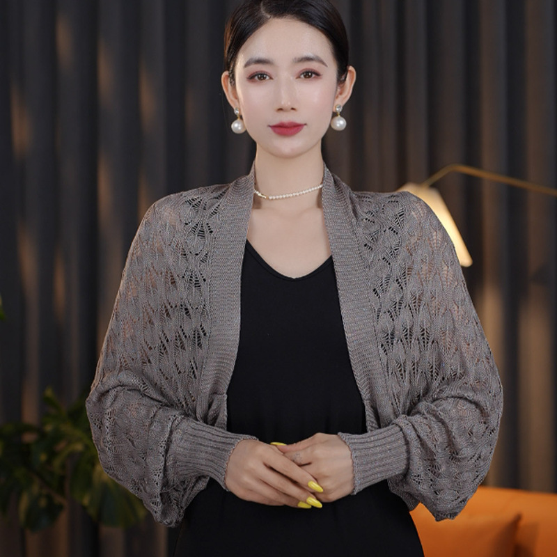 韓国版のファッションの新型の百合の明るい色の氷の糸のメリヤスの外で袖の旅行のエアコンのマントを掛けます。|undefined